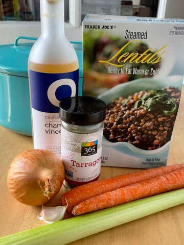 Ingredients for 15 Minute Lentil Ragout which include celery, carrot, onion, garlic, dried tarragon, Trader Joe's French lentils.